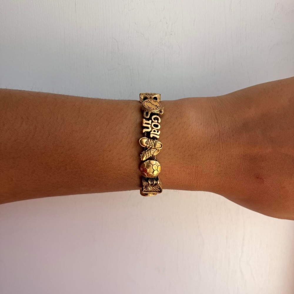 GOLD TONE SOCCER THEMED SLIDING CHARM BRACELET